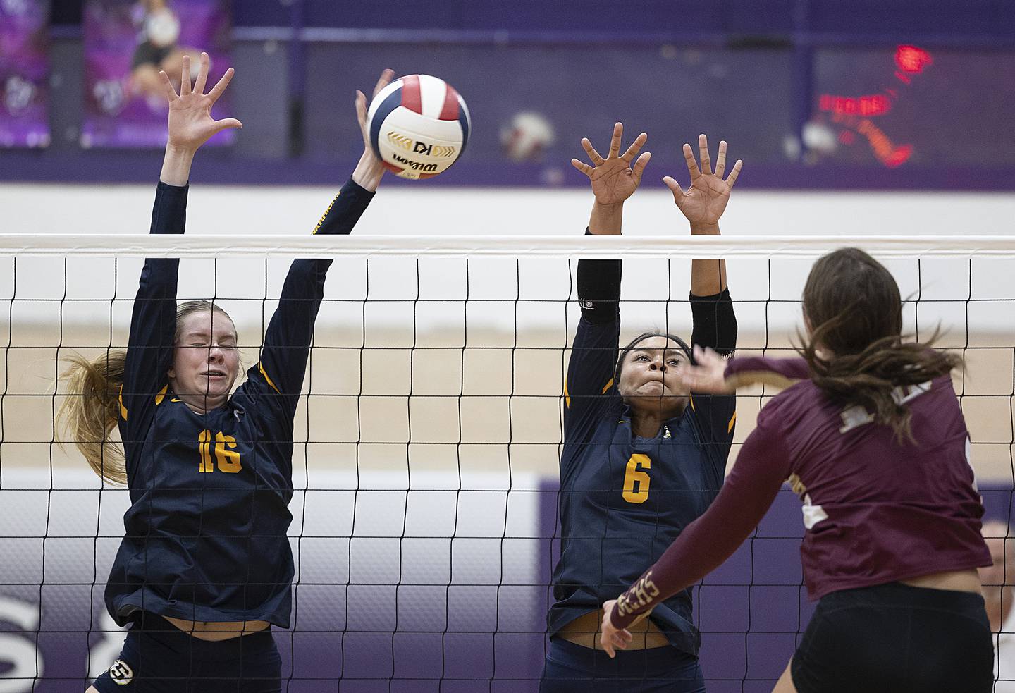 Sterling’s Kasey Weeks (left) and Alasia Harris Rascon work the net against Morris Tuesday, Oct. 29, 2024, at the class 3A regional semifinal in Dixon.
