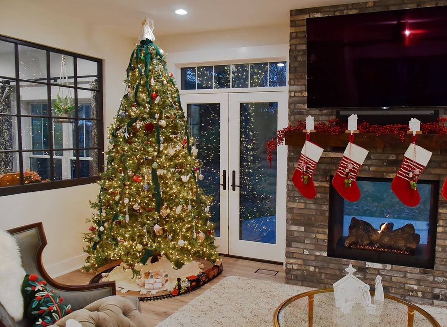 Artificial holiday trees, like this one in Dan and Kari Schake's Mount Prospect home, can't be recycled, so it's best to take care of them over many years to keep them out of landfills.