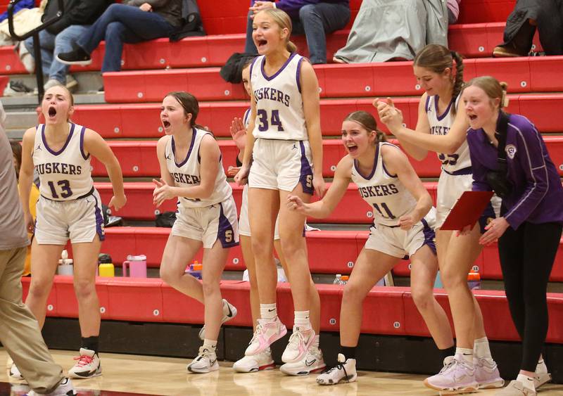 Members of the Serena Lady Huskers basketball team react after winning the Little Ten Conference championship over Hinckley-Big Rock on Friday, Jan. 24, 2025 at Earlville High School.
