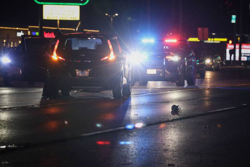Crystal Lake police investigate a car versus pedestrian crash that occurred at Route 14 and Pingree Road about 7 p.m. Monday, Dec. 20, 2021.