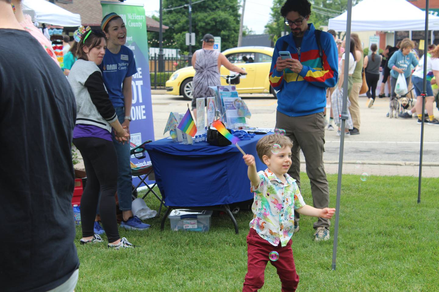 Over 100 people gathered Sunday morning in downtown Crystal Lake to celebrate the city’s first gay pride event with music, food, a vendor market and karaoke.
