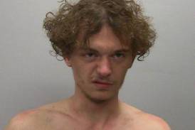 Dixon man enters not guilty plea to felony armed violence, multiple weapons violations 