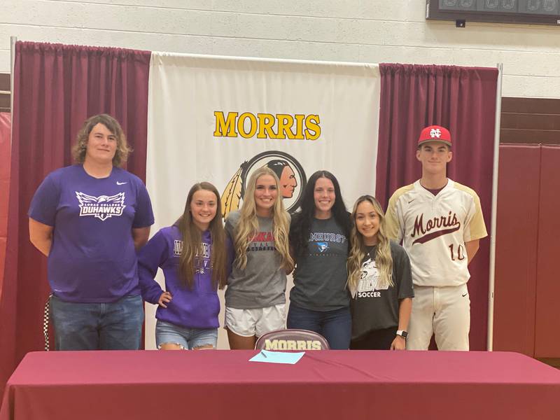 Six Morris senior athletes announced Wednesday night their plans to continue their athletic careers in college.  From Left: Will Lawyer (Lorras College), Payton Kjellesvik (Joliet Junior College),Jaelyn Wiers (Kankakee College) ,Madigan Doss (Elmhurst University),Adriana Plascencia (Joliet Junior College), andRyan Fisher ( North Central College).