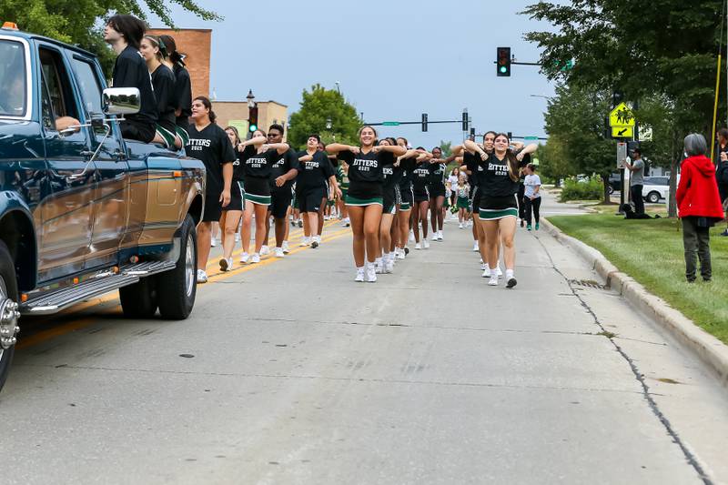 Glenbard West cheerleaders march in the Glenbard West Homecoming Parade.  Sept 16, 2023
