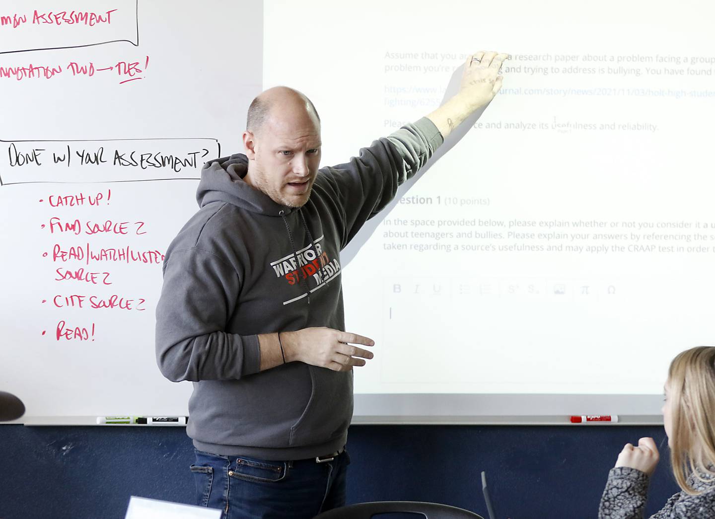 English teacher Dane Erbach teaches about media literacy Tuesday Nov. 22, 2022, during a class at McHenry High School's freshman campus, 1012 N. Green St. in McHenry. The students are using a method where they determine the currency, relevance, authority, accuracy, and purpose of a story.