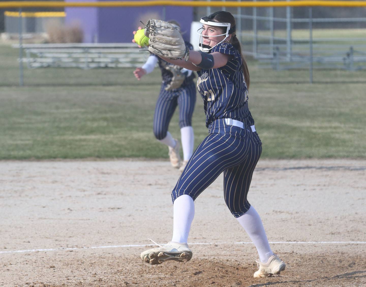 Marquette pitcher Kinley Rick fires a throw against Serena on Wednesday, March 26, 2025 at Serena High School.