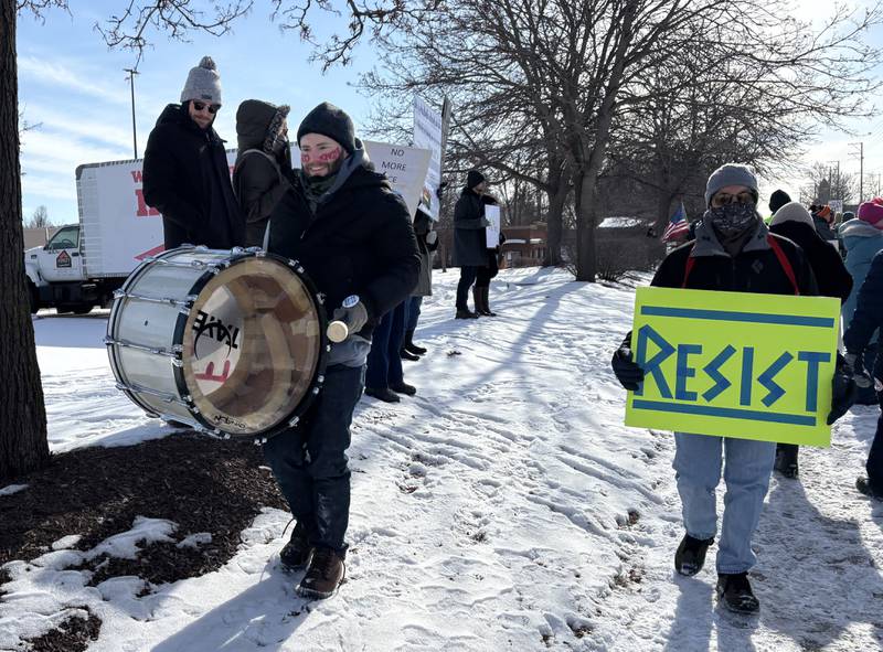 Protesters walk during a protest in McHenry Feb. 1, 2026.