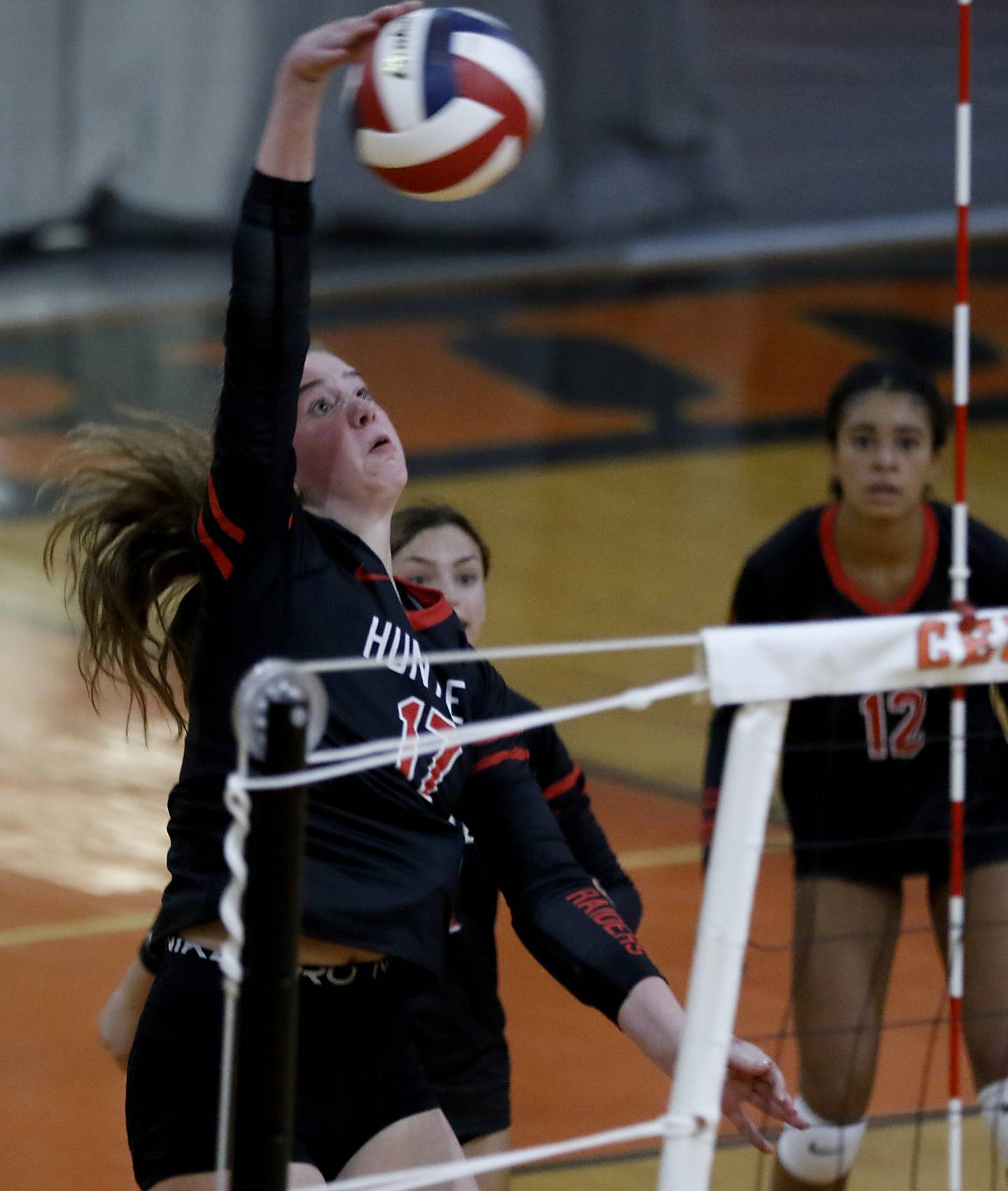 Huntley’s Georgia Watson spikes the ball during a Fox Valley Conference volleyball match Tuesday, Aug. 23, 2022, between Crystal Lake Central and Huntley at Crystal Lake Central High School.