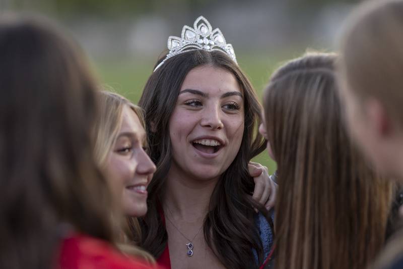 Ellie Brooks gets surrounded by friends right after being crowned Hall High School Homecoming Queen 2024 at Richard Nesti Stadium on September 26, 2024.