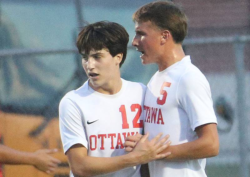 Ottawa's Luca Fernandez reacts with teammate Rory Moore after scoring a goal on a penalty kick in the box against L-P on Monday, Oct. 6, 2025 at the L-P Athletic Complex in La Salle.