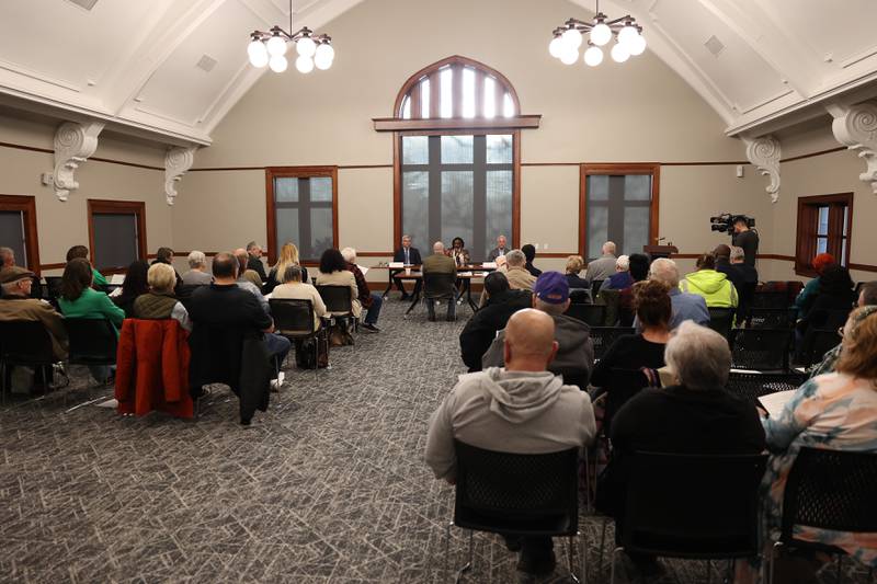 Joliet mayor Bob O’Dekirk (left), mayor candidates Tycee Bell and Terry D’Arcy attend a forum for the candidates at the Joliet Public Library on Tuesday, March 28th, 2023 in Joliet.