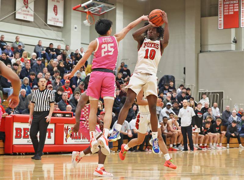 Yorkville’s Kevin Johnson (10) takes a long shot against Whitney Young during the When Sides Collide Shootout on Saturday, Jan. 20, 2024 in Lisle, IL.
