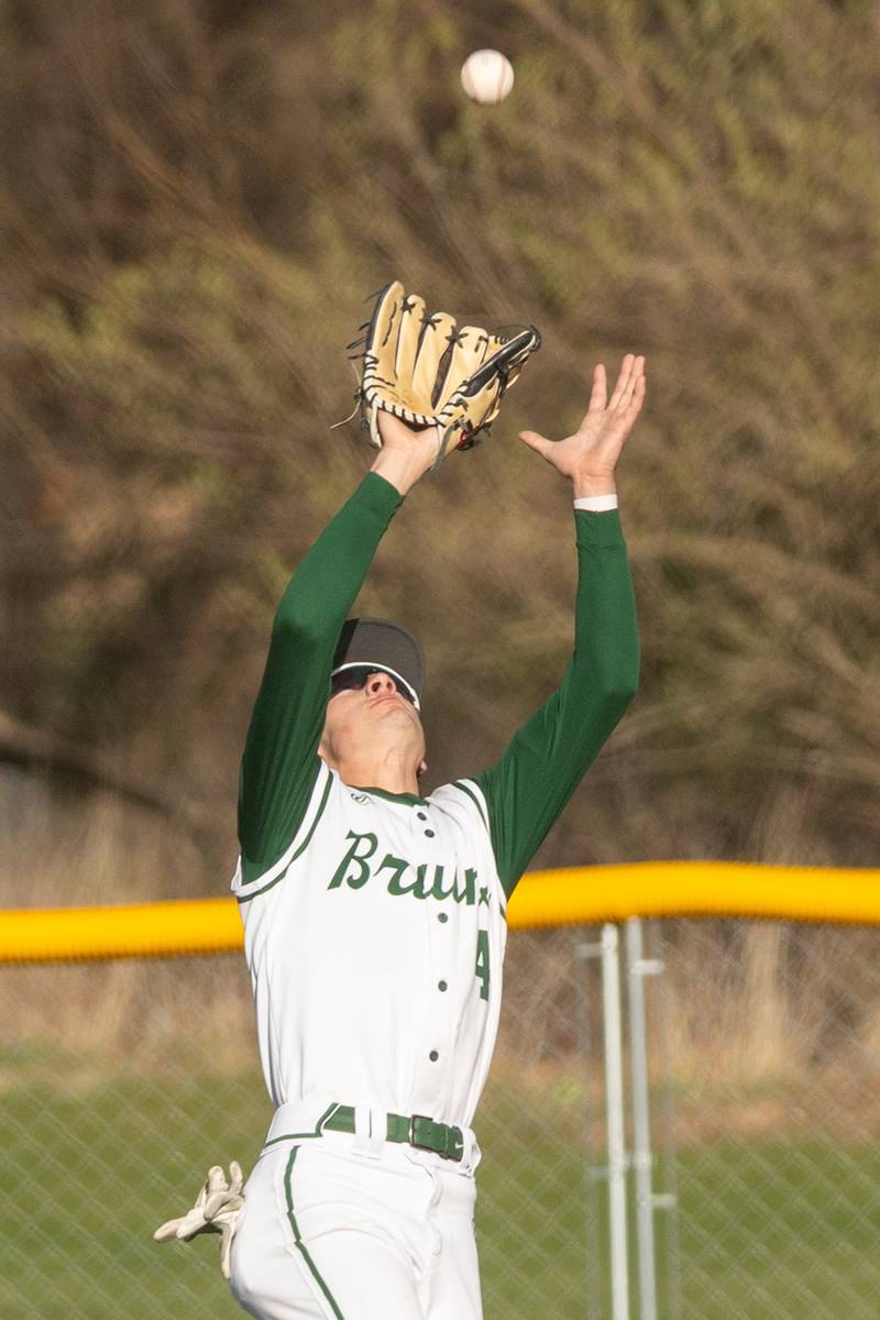 Gino Ferrari (4) of St. Bede catches fly ball in right field on Tuesday, April 15, 2025 at St. Bede Academy in Peru.
