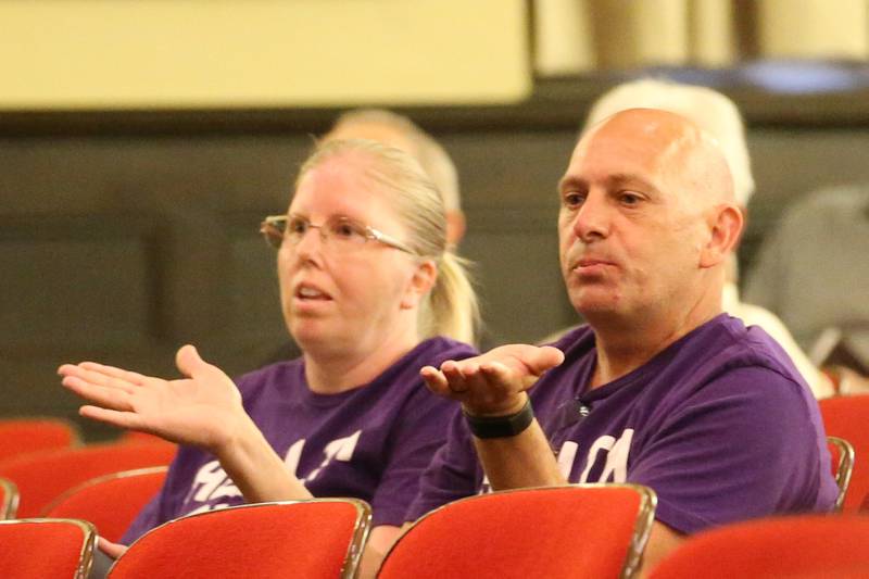 Linda and Mike Battaglia react during the Carus town hall meeting on Wednesday, May 10, 2023 in Matthiessen Auditorium at LaSalle-Peru Township High School.