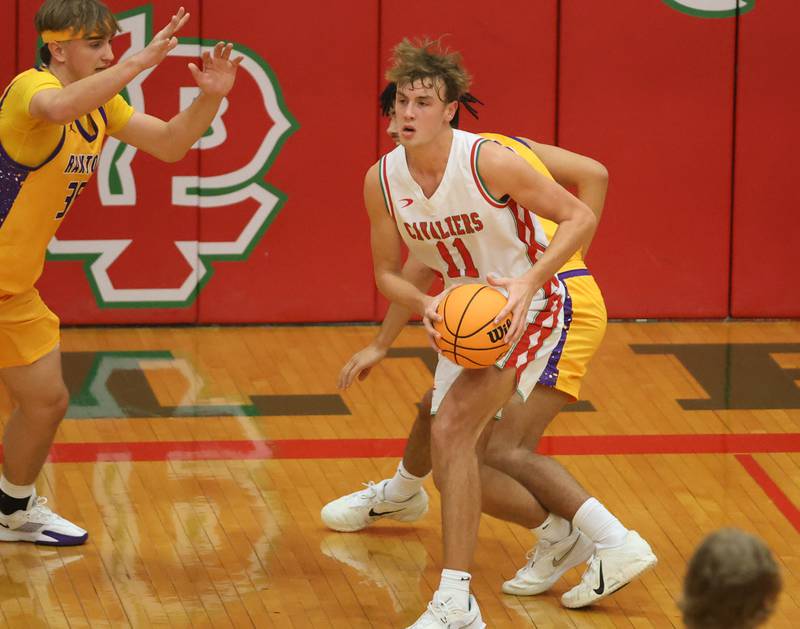L-P's Jameson Hill grabs a rebound against Rantol on Friday, Dec. 19, 2025 in Sellett Gymnasium at L-P High School.