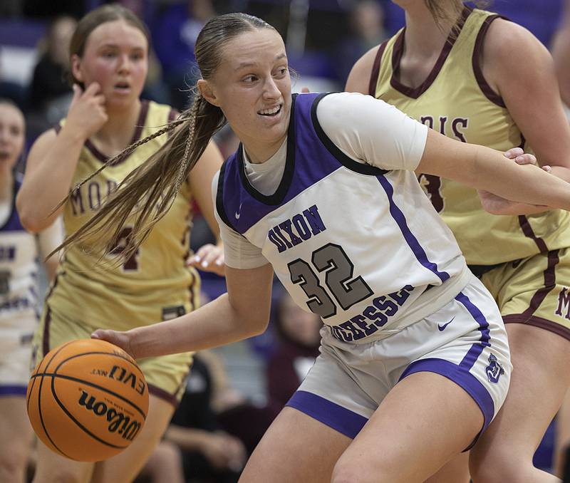 Dixon's Makenzie Toms works down low against Morris Friday, Jan. 3, 2025, at Dixon High School.
