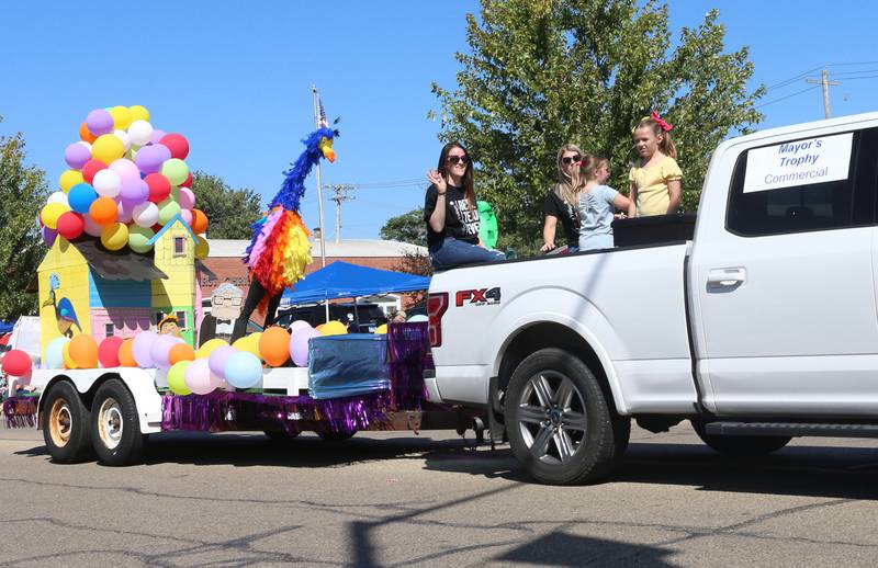A Disney Pixar "Up" themed float travels down Main Street during the 52nd annual Homestead Festival parade on Saturday, Sept. 9, 2023 in Princeton.