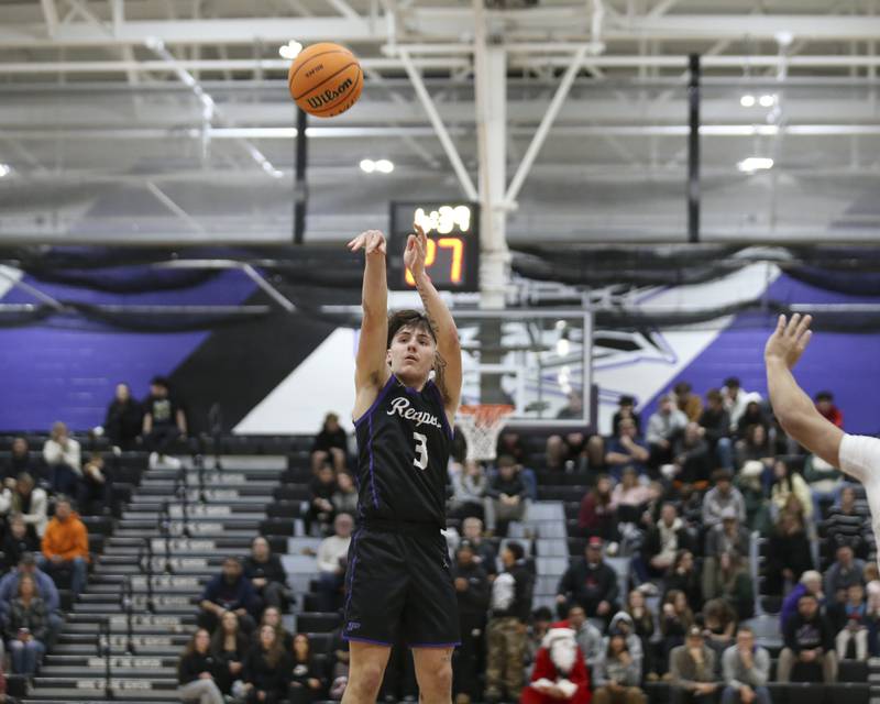 Plano's Ethan Taxis (3) lets fly a jumper from the top of the key during their Plano Christmas Classic basketball game between Streator at Plano Friday, Dec 26, 2025 in Plano.