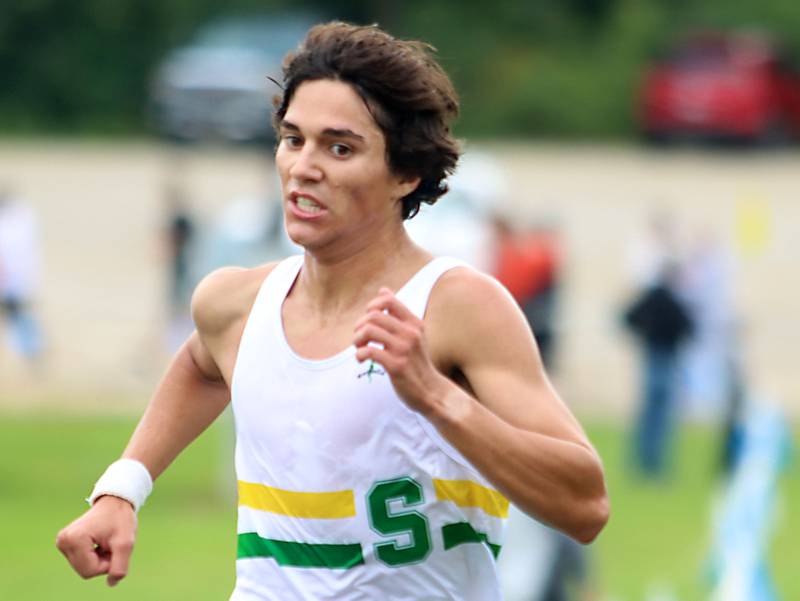 Crystal lake South’s Joseph Gonzalez finishes the boys varsity race during the McHenry County Cross Country Meet at Emricson park in Woodstock on Saturday, August 30, 2025.