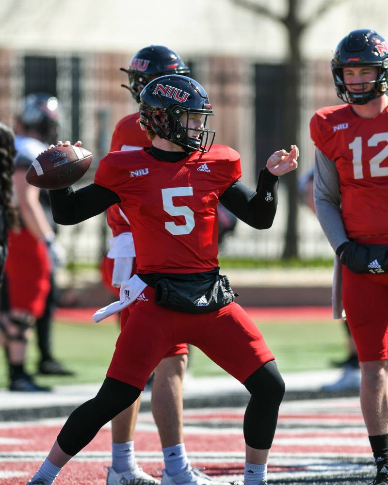 Northern Illinois University quarterback Justin Lynch (5) warms up on Saturday April 16th at Huskie stadium in DeKalb for a spring scrimmage.