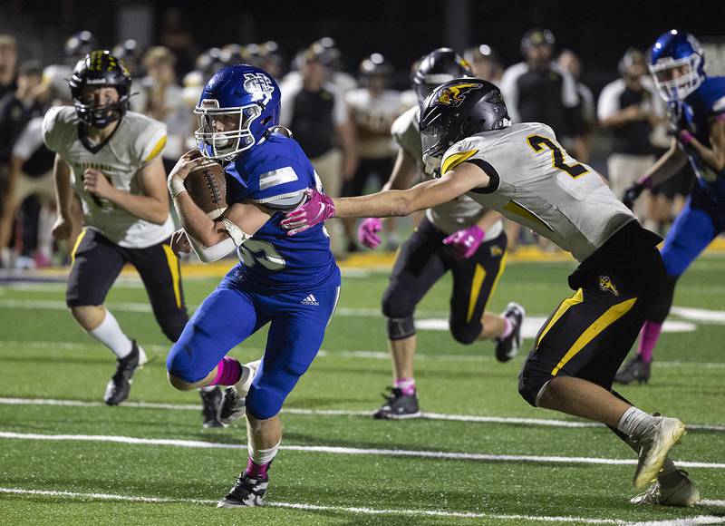 Newman’s Daniel Kelly heads for the end zone against Riverdale Friday, October 11, 2024, in Sterling.