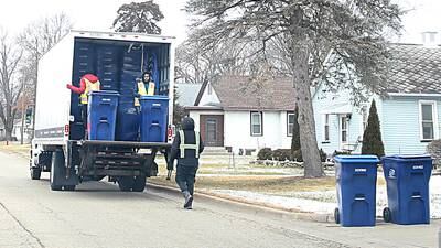 New La Salle garbage hauler delivers bins