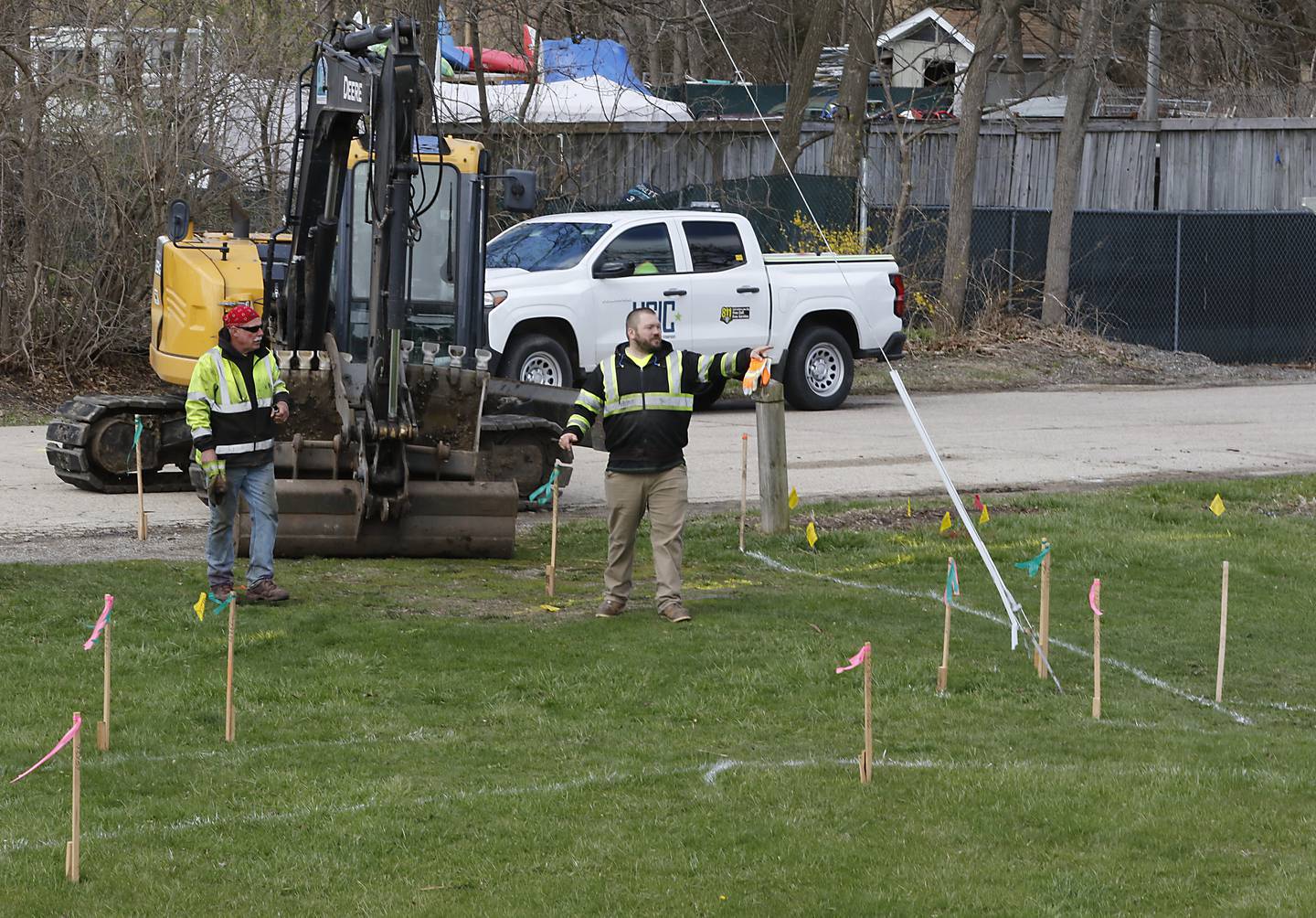 Workers for the Nunda Township highway department, remove a guard rail on Tuesday, April 15, 2025, as they begin to install a parking lot and park. Mike Lesperance,  the outgoing Nunda Township Highway Commissioner, is  build a park and parking lot next to a township bridge over the Fox river on Rawson Bridge Road in Cary.