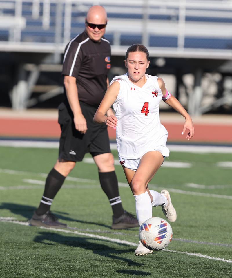 Hinsdale Central's Carter Knotts (4) tracks down the ball during the IHSA Class 3A girls soccer sectional final match between Lyons Township and Hinsdale Central at Reavis High School in Burbank on Friday, May 26, 2023.