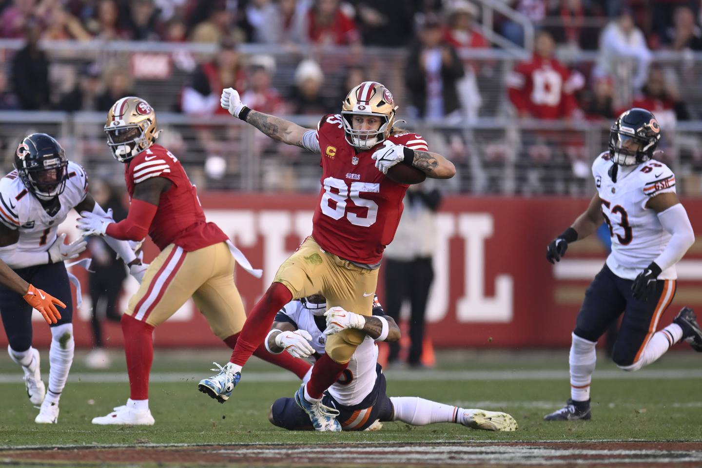 San Francisco 49ers tight end George Kittle (85) runs against the Chicago Bears during the first half of an NFL football game in Santa Clara, Calif., Sunday, Dec. 8, 2024.
