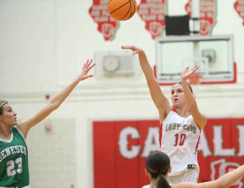 L-P's Kelsey Frederick shoots a jump shot over Geneseo's Kendall Ellerbrock and Kendyl Wassenhove on Tuesday, Feb. 4, 2025 in AJ Sellett Gymnasium at L-P High School.