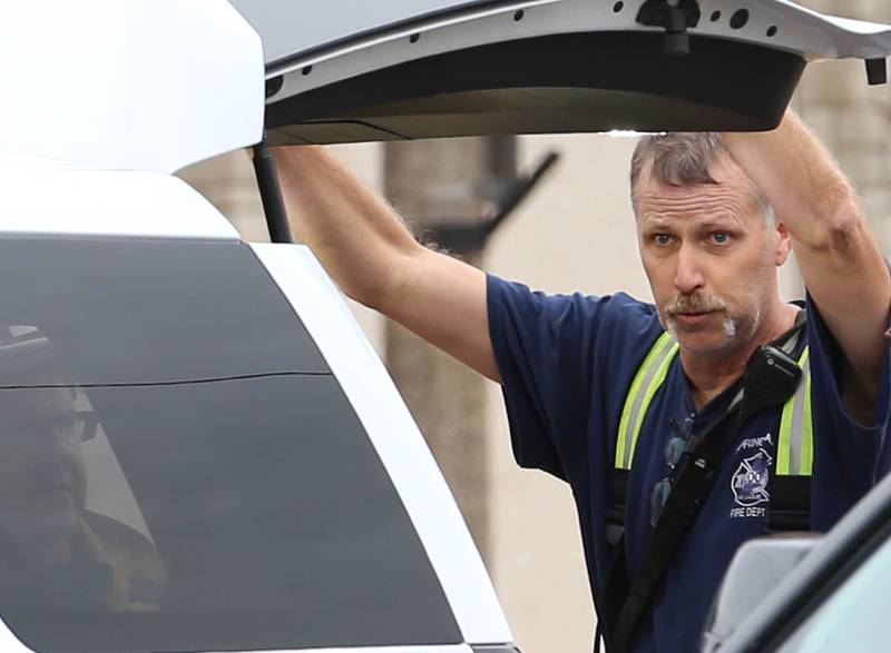 Spring Valley fire chief Todd Bogatitus commands the scene at 201 North Main Street on Monday, Aug. 14, 2023 in Ladd.