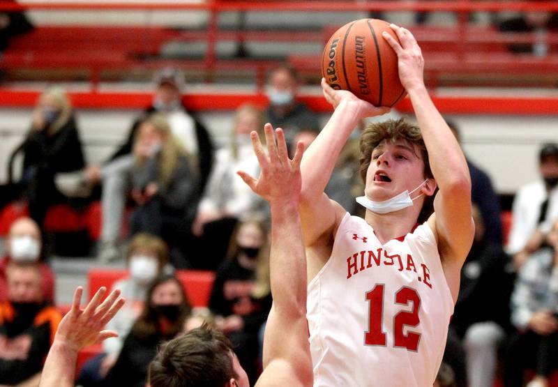 Hinsdale Central's Benjamin Oosterbaan shoots the ball during a 2021 Hinsdale Central Holiday Classic game against St. Charles East on Wednesday, Dec. 22, 2021.