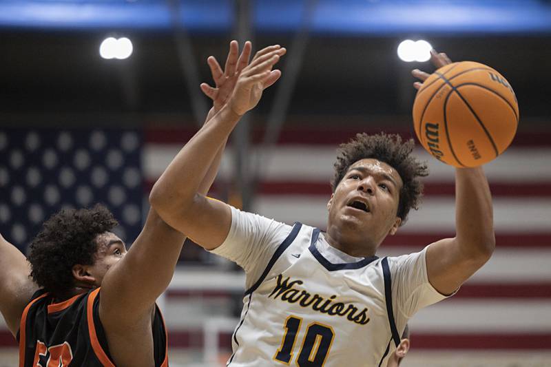 Sterling’s Koby Bell loses the ball against UT Friday, Jan. 16, 2026.