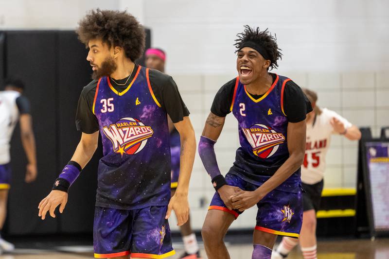 Lucius “Too Tall” Winston (2) of the Harlem Wizards celebrates after scoring on Wednesday, April 16, 2025 at Woodland High School in Streator.