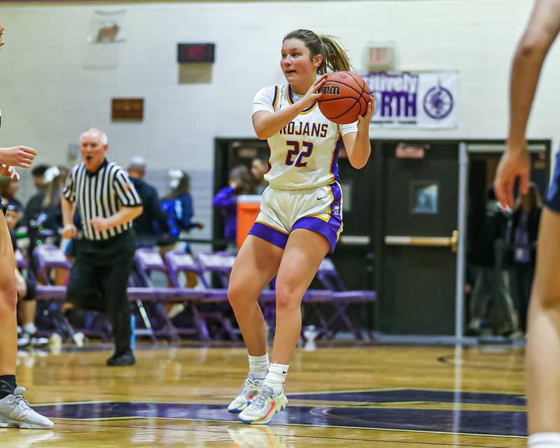 Downers Grove North's Lilly Boor (22) catches a pass at the top of the key during girls basketball game between Downers Grove South at Downers Grove North. Dec 16, 2023.