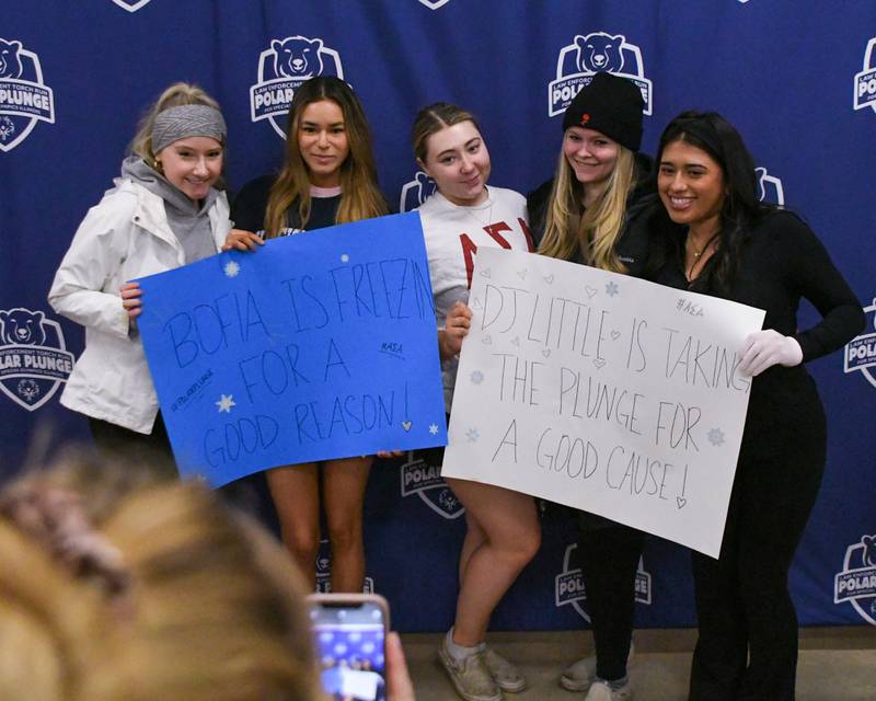 (From left) Northern Illinois University Alpha Sigma Alpha sorority sisters Monica Radev, Sofia Berzosa, Madi Little, Lainey Cloudio and Ashley Lopez pose for a photo on Saturday, Feb. 15, 2025, before partaking in the 2nd annual Polar Plunge at Northern Illinois University's Huskie Stadium in DeKalb. Proceeds benefited the law enforcement torch run for Special Olympics.