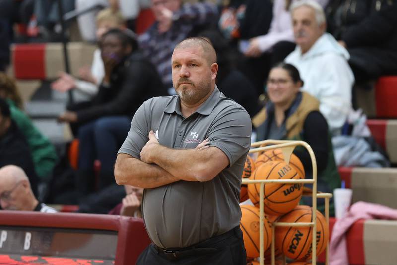Plainfield North head coach Robert Krahulik stands on the sidelines against Plainfield East on Tuesday, Dec. 9, 2025 in Plainfield.