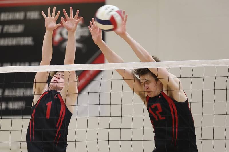 Lincoln-Way Central’s Joey Vellenga and Logan Baechtold go for the block against Bolingbrook on Tuesday May 7, 2024 in New Lenox.