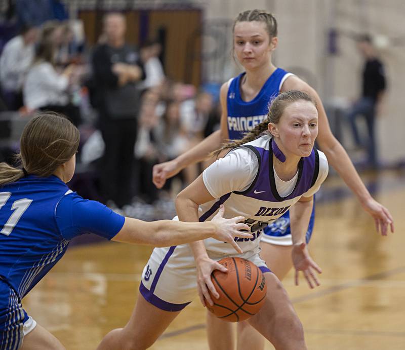 Dixon’s Katie Drew handles the ball against Princeton Thursday, Jan. 4, 2024 at Dixon High School.