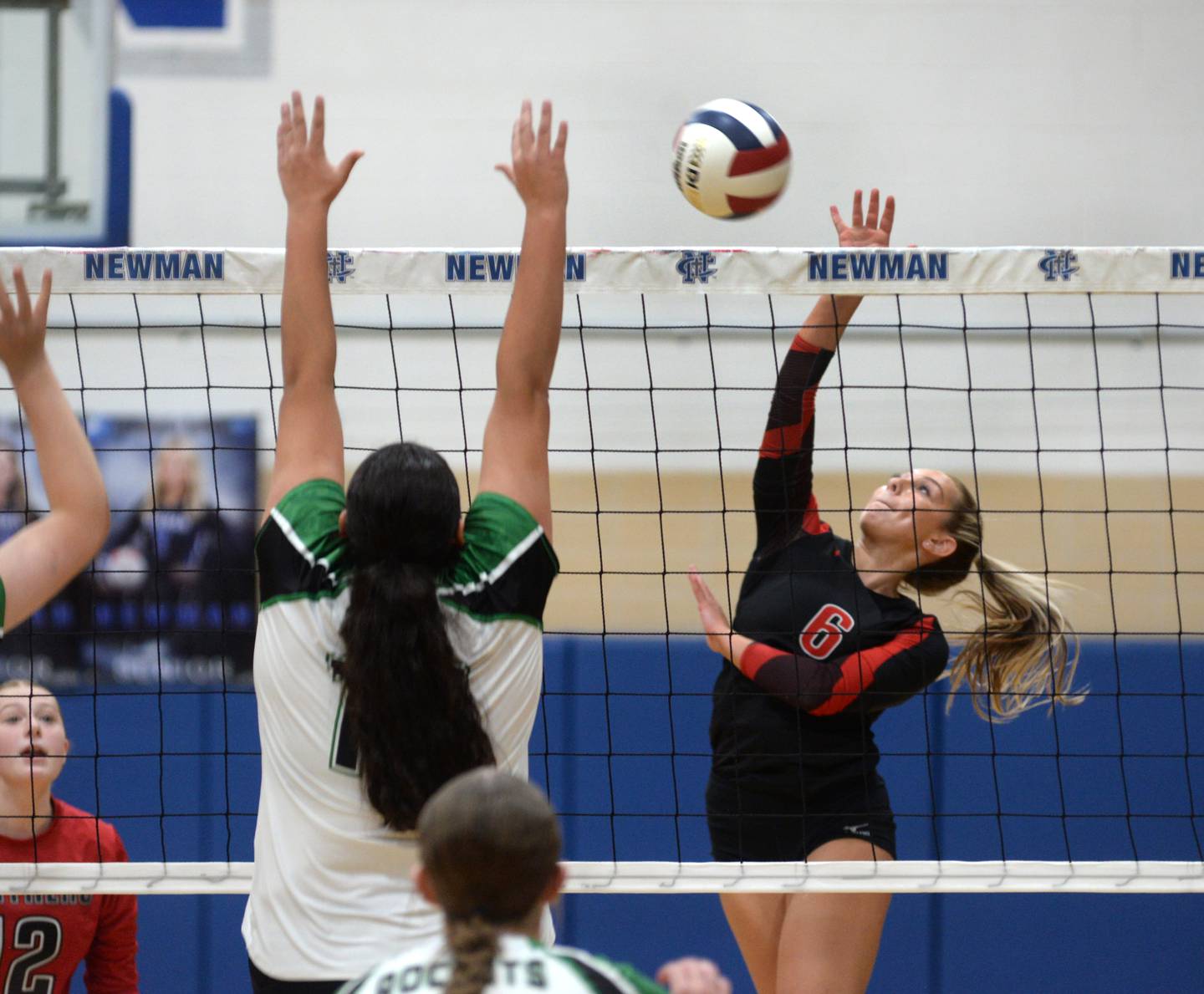 Erie-Prophetstown's Jamie Neumiller (6) hits the ball over Rock Falls defenders during the championship of the 2A Sterling Newman Regional on Thursday, Oct. 31, 2024.