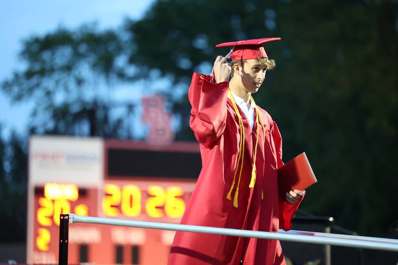 Graduate Christian Munsterman holds his tassel after receiving his diploma during the Bradley-Bourbonnais Community High School commencement ceremony on Thursday, May 21, 2026.