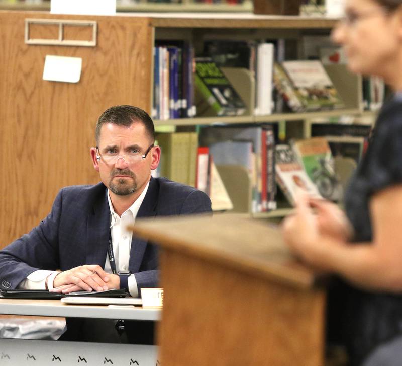 Sycamore School District 427 Superintendent Steve Wilder listens to a speaker who is asking that the board not require students to wear masks when they return in the fall. A group of parents were in attendance Tuesday at the meeting at Sycamore High School requesting that the board make mask wearing optional for students in the district.