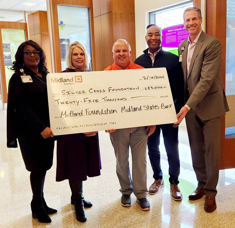 The Silver Cross Foundation recently received a $25,000 contribution from Midland States Bank. Pictured are (from left) Leslie Newbon, Silver Cross Hospital manager of community relations; Tracy Simons, Silver Cross Foundation executive director; Dan Stevenson, Midland States Bank executive vice president of consumer banking and wealth management; Cornell Lurry, Midland States Bank regional community development relationship manager; and Scott Paddock, Silver Cross Hospital senior vice president of external affairs.