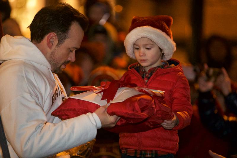 Graham's delivers the first candy cane at the Geneva Christmas Walk on Friday, Dec.1 2023 in Geneva.