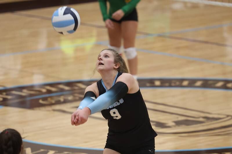 Joliet Catholic’s Jess Horn keeps the volley going against Providence on Thursday, Sept. 14, in Joliet.