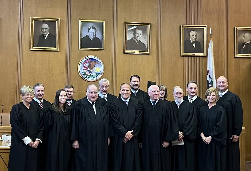 Bureau County State’s Attorney Geno Caffarini has been sworn in as a judge after he was tabbed to replace retiring Circuit Judge Marc P. Bernabei.