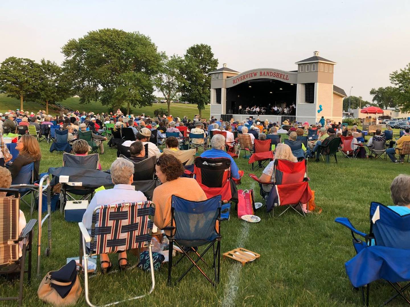 A crowd in lawn chairs gathers for the Clinton Symphony Orchestra's Pops Concert in an undated photo at the Riverview Bandshell in Clinton, Iowa.