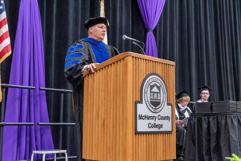 McHenry County College President Clint Gabbard welcomes students to the commencement ceremony on Saturday, May 14, 2022, in the college's gymnasium.
