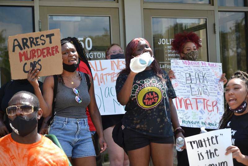 About 30 mostly student protesters gathered outside of the Joliet Police Department on July 7, 2020 over the overdose death of Eric Lurry in police custody last January.