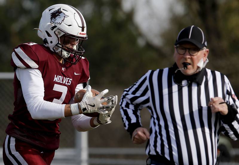 Prairie Ridge's Elijah Loeding juggles the football as he catches a touchdown catch during an IHSA Class 5A first-round football game against Chicago Goode on Saturday, Nov. 2, 2024, at Prairie Ridge High School in Crystal Lake.